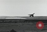 Image of Fatal crash of F-100 Super Sabre jet fighter aircraft California United States USA, 1956, second 16 stock footage video 65675067049