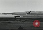Image of Fatal crash of F-100 Super Sabre jet fighter aircraft California United States USA, 1956, second 19 stock footage video 65675067049