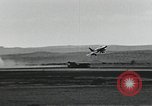 Image of Fatal crash of F-100 Super Sabre jet fighter aircraft California United States USA, 1956, second 20 stock footage video 65675067049
