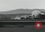Image of Fatal crash of F-100 Super Sabre jet fighter aircraft California United States USA, 1956, second 25 stock footage video 65675067049