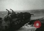 Standbild USS LST-349 Gründer auf Felsen aus Ponza Italien im Sturm Italien, 1944, aus Sekunde 9 historischem Filmmaterial Videoclip 65675067074