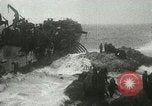 Standbild USS LST-349 Gründer auf Felsen aus Ponza Italien im Sturm Italien, 1944, aus Sekunde 41 historischem Filmmaterial Videoclip 65675067074