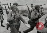 Image of U.S. Army Rangers boarding British landing craft  Weymouth England United Kingdom, 1944, second 29 stock footage video 65675067145