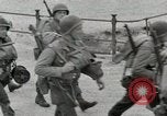 Image of U.S. Army Rangers boarding British landing craft  Weymouth England United Kingdom, 1944, second 30 stock footage video 65675067145