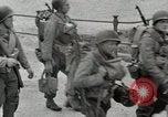 Image of U.S. Army Rangers boarding British landing craft  Weymouth England United Kingdom, 1944, second 31 stock footage video 65675067145