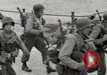 Image of U.S. Army Rangers boarding British landing craft  Weymouth England United Kingdom, 1944, second 33 stock footage video 65675067145
