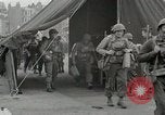 Image of U.S. Army Rangers boarding British landing craft  Weymouth England United Kingdom, 1944, second 42 stock footage video 65675067145
