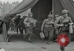 Image of U.S. Army Rangers boarding British landing craft  Weymouth England United Kingdom, 1944, second 43 stock footage video 65675067145