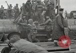Image of U.S. Army Rangers boarding British landing craft  Weymouth England United Kingdom, 1944, second 49 stock footage video 65675067145