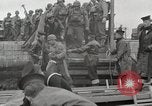 Image of U.S. Army Rangers boarding British landing craft  Weymouth England United Kingdom, 1944, second 52 stock footage video 65675067145