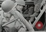 Image of U.S. Army Rangers boarding British landing craft  Weymouth England United Kingdom, 1944, second 58 stock footage video 65675067145