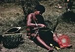 Image of native man Pacific Theater, 1945, second 4 stock footage video 65675067201
