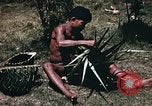 Image of native man Pacific Theater, 1945, second 8 stock footage video 65675067201