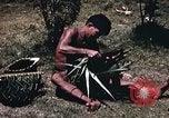 Image of native man Pacific Theater, 1945, second 10 stock footage video 65675067201