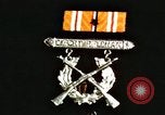 Image of medals on coat Mariana Islands, 1945, second 1 stock footage video 65675067213