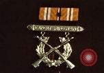 Image of medals on coat Mariana Islands, 1945, second 3 stock footage video 65675067213