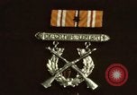Image of medals on coat Mariana Islands, 1945, second 4 stock footage video 65675067213