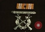 Image of medals on coat Mariana Islands, 1945, second 5 stock footage video 65675067213