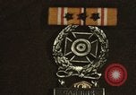 Image of medals on coat Mariana Islands, 1945, second 7 stock footage video 65675067213