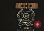 Image of medals on coat Mariana Islands, 1945, second 8 stock footage video 65675067213