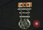 Image of medals on coat Mariana Islands, 1945, second 10 stock footage video 65675067213