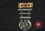 Image of medals on coat Mariana Islands, 1945, second 11 stock footage video 65675067213