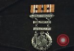 Image of medals on coat Mariana Islands, 1945, second 12 stock footage video 65675067213