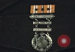 Image of medals on coat Mariana Islands, 1945, second 13 stock footage video 65675067213
