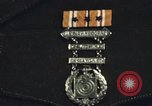 Image of medals on coat Mariana Islands, 1945, second 15 stock footage video 65675067213