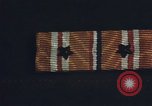 Image of medals on coat Mariana Islands, 1945, second 21 stock footage video 65675067213