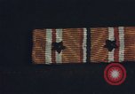 Image of medals on coat Mariana Islands, 1945, second 23 stock footage video 65675067213