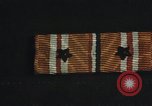 Image of medals on coat Mariana Islands, 1945, second 25 stock footage video 65675067213