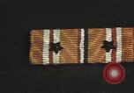 Image of medals on coat Mariana Islands, 1945, second 29 stock footage video 65675067213