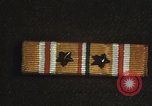 Image of medals on coat Mariana Islands, 1945, second 32 stock footage video 65675067213