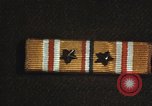 Image of medals on coat Mariana Islands, 1945, second 37 stock footage video 65675067213