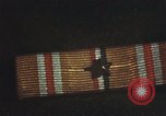 Image of medals on coat Mariana Islands, 1945, second 40 stock footage video 65675067213