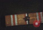 Image of medals on coat Mariana Islands, 1945, second 42 stock footage video 65675067213