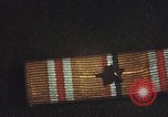 Image of medals on coat Mariana Islands, 1945, second 46 stock footage video 65675067213