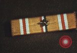 Image of medals on coat Mariana Islands, 1945, second 48 stock footage video 65675067213
