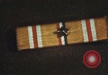 Image of medals on coat Mariana Islands, 1945, second 49 stock footage video 65675067213
