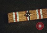 Image of medals on coat Mariana Islands, 1945, second 51 stock footage video 65675067213