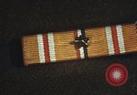 Image of medals on coat Mariana Islands, 1945, second 52 stock footage video 65675067213