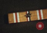 Image of medals on coat Mariana Islands, 1945, second 53 stock footage video 65675067213