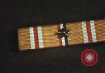 Image of medals on coat Mariana Islands, 1945, second 54 stock footage video 65675067213