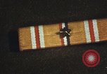 Image of medals on coat Mariana Islands, 1945, second 55 stock footage video 65675067213