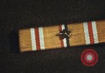 Image of medals on coat Mariana Islands, 1945, second 56 stock footage video 65675067213