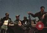 Image of men on jeep Mariana Islands, 1945, second 1 stock footage video 65675067214