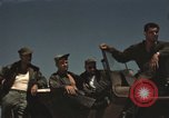 Image of men on jeep Mariana Islands, 1945, second 3 stock footage video 65675067214