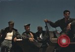Image of men on jeep Mariana Islands, 1945, second 4 stock footage video 65675067214