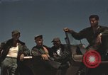 Image of men on jeep Mariana Islands, 1945, second 5 stock footage video 65675067214